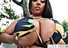Babe Teases Big Tits Outdoors