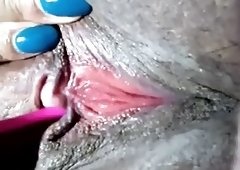 Kitty Rosario masturbates with a vibrator, BBW closeup